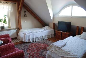 Фото номера Двухместный номер с 2 отдельными кроватями Отель Hotel Ogród Przysmaków г. Хлудово 4